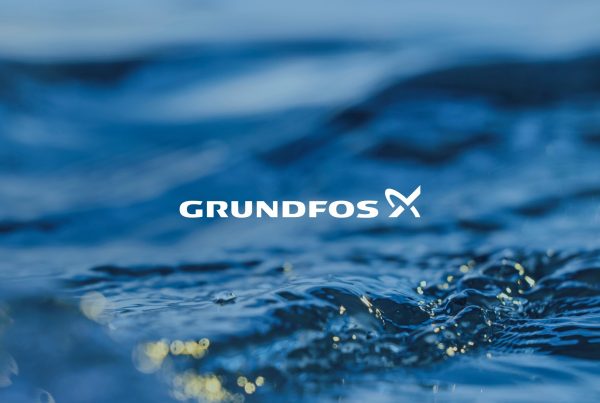 Grundfos logo on a deep blue water surface